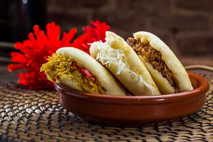 Savoring Latin America's Culinary Treasures: Argentina's Chimichurri, Dulce de Leche, and Venezuela's Arepas