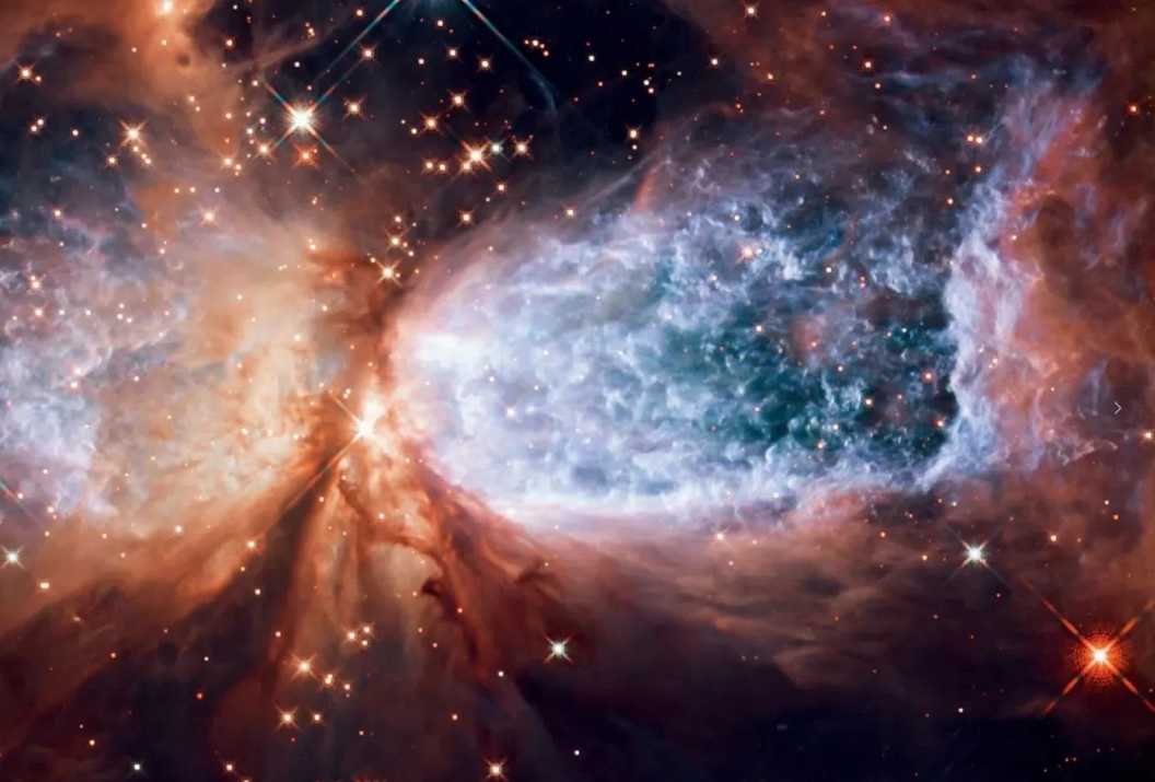 The Cosmic Snow Angel: Hubble Captures S106 IR's Star - Forming Region